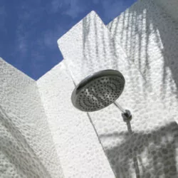 Luxurious outdoor shower at a honeymoon resort in Indonesia, offering a romantic and serene experience for couples